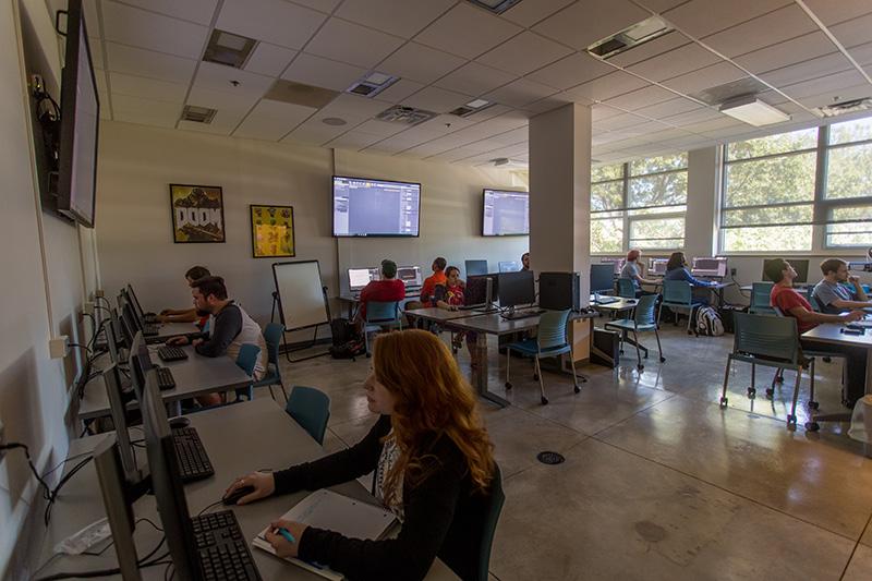 Students in a computer lab working on projects