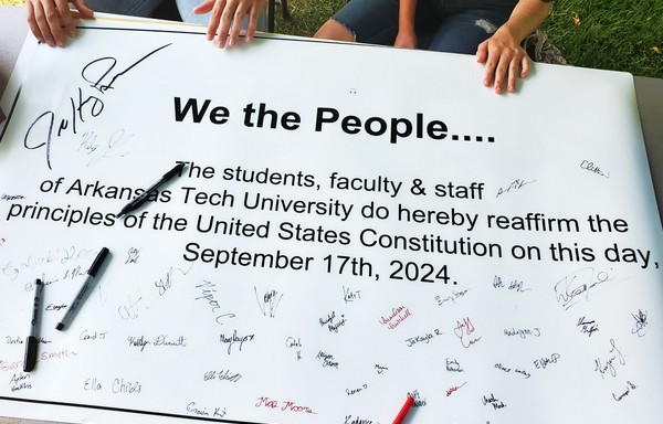 Student signatures on Constitution Day banner